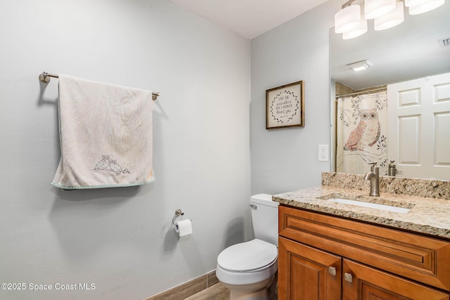 4027 Secretariat Ln, Malabar, FL 32950 - bathroom with vanity and toilet