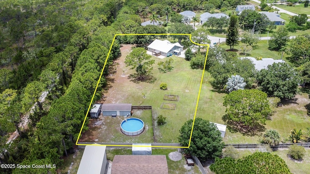 4027 Secretariat Ln, Malabar, FL 32950 - aerial view of property and surrounding area featuring property boundaries highlighted and a pool