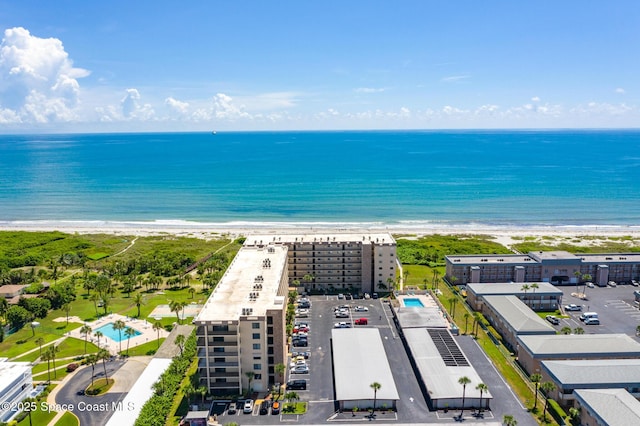 3170 N Atlantic Ave Unit 407, Cocoa Beach, FL 32931 - bird's eye view of waterfront with a beach