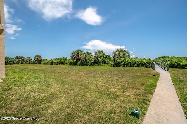 3170 N Atlantic Ave Unit 407, Cocoa Beach, FL 32931 - view of grassy yard