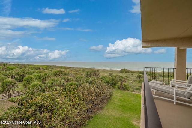 3170 N Atlantic Ave Unit 407, Cocoa Beach, FL 32931 - view of yard featuring view of water and beach and a balcony