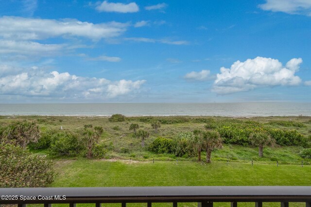 3170 N Atlantic Ave Unit 407, Cocoa Beach, FL 32931 - view of grassy yard with a water view