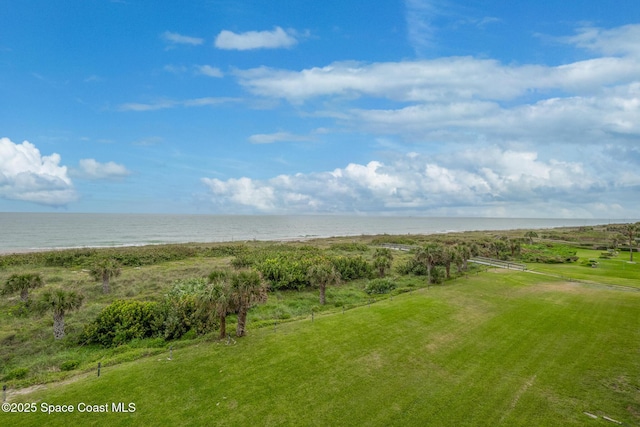3170 N Atlantic Ave Unit 407, Cocoa Beach, FL 32931 - view of green lawn with a water view