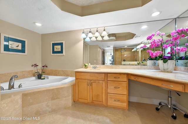 211 S 24th St Unit 202, Cocoa Beach, FL 32931 - full bath featuring a garden tub, vanity, a shower stall, and tile patterned flooring