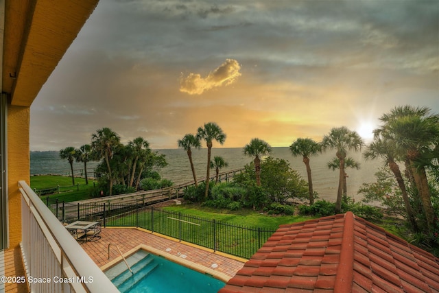 211 S 24th St Unit 202, Cocoa Beach, FL 32931 - view of pool with a water view and a patio