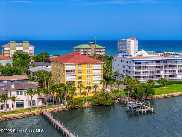 211 S 24th St Unit 202, Cocoa Beach, FL 32931 - bird's eye view of a nearby body of water and apartment complex