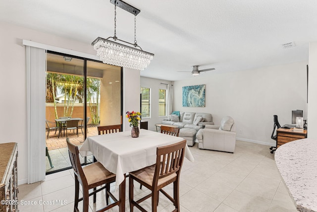 1415 Lara Cir Unit 105, Rockledge, FL 32955 - dining room featuring light tile patterned flooring, ceiling fan, baseboards, an office area, and a chandelier