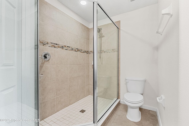 1415 Lara Cir Unit 105, Rockledge, FL 32955 - full bath featuring toilet, a shower stall, and tile patterned flooring