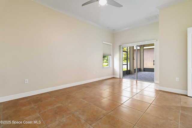 3140 Constellation Dr, Melbourne, FL 32940 - spare room with light tile patterned floors, a ceiling fan, and baseboards