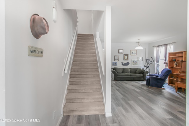 4345 Millicent Cir, Melbourne, FL 32901 - stairway featuring wood finished floors and baseboards