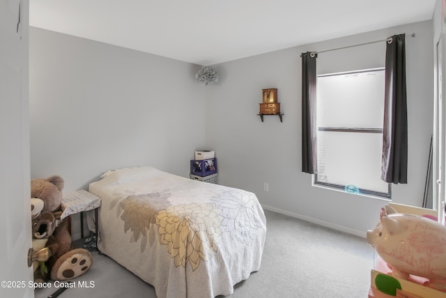 4345 Millicent Cir, Melbourne, FL 32901 - carpeted bedroom featuring baseboards