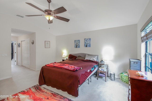 4345 Millicent Cir, Melbourne, FL 32901 - carpeted bedroom with vaulted ceiling, baseboards, and a ceiling fan