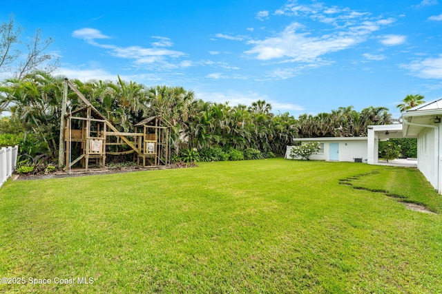 600 Atlantic St, Melbourne Beach, FL 32951 - view of yard with a playground