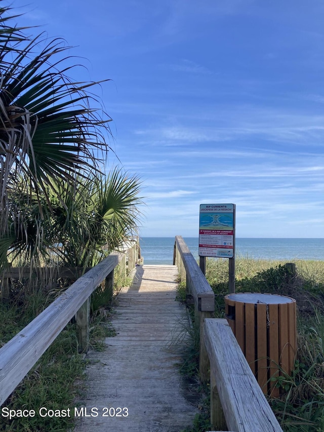 115 E Colonial Ct Unit C, Indian Harbour Beach, FL 32937 - view of community featuring view of water and beach