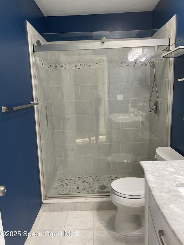 115 E Colonial Ct Unit C, Indian Harbour Beach, FL 32937 - full bath featuring vanity, toilet, a stall shower, and marble look tile flooring