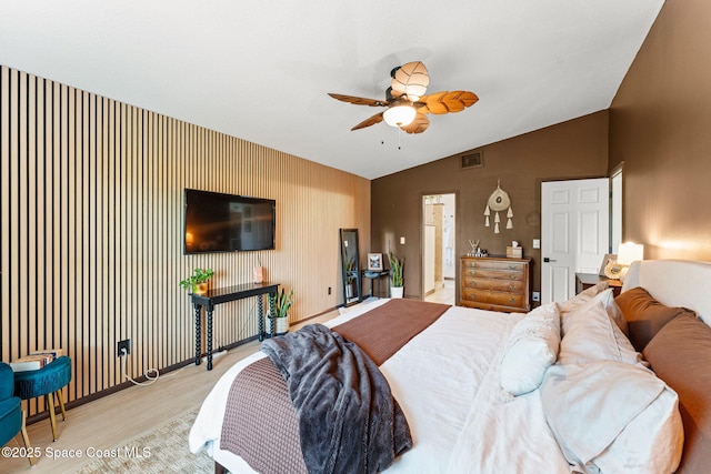 740 Hunan St NE, Palm Bay, FL 32907 - bedroom with light wood-style floors, lofted ceiling, and ceiling fan