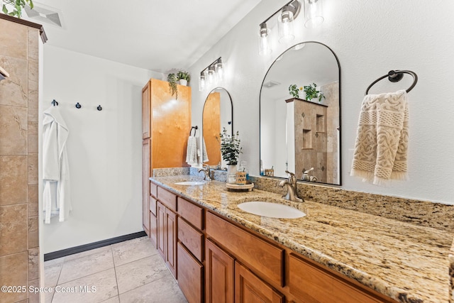 740 Hunan St NE, Palm Bay, FL 32907 - full bathroom featuring double vanity, tiled shower, and tile patterned floors