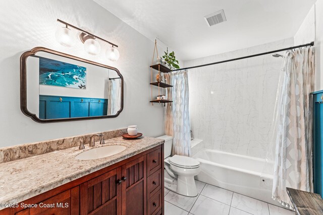 740 Hunan St NE, Palm Bay, FL 32907 - bathroom with shower / bath combination with curtain, vanity, and marble finish floors