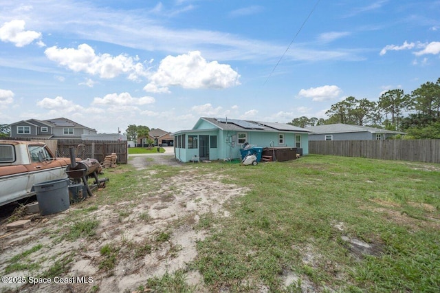 926 Caligula Ave SE, Palm Bay, FL 32909 - view of yard featuring a hot tub