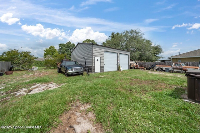 926 Caligula Ave SE, Palm Bay, FL 32909 - view of yard featuring a garage and an outdoor structure