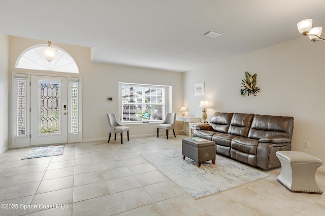 4299 Alligator Flag Cir, West Melbourne, FL 32904 - living area with light tile patterned flooring and baseboards