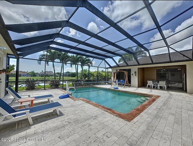 3180 Savannahs Trl, Merritt Island, FL 32953 - outdoor pool with a patio area and glass enclosure