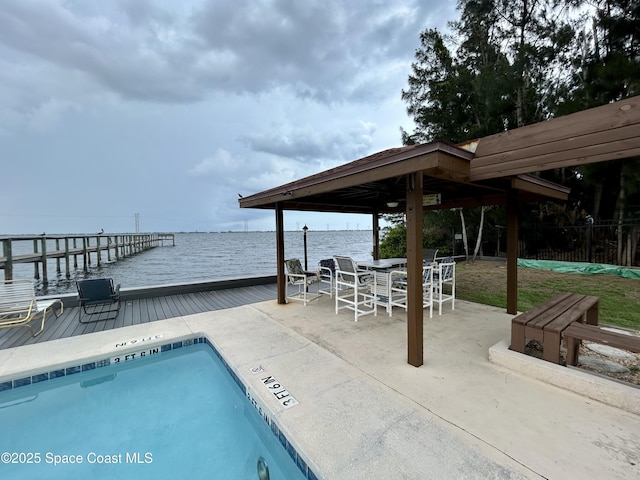 2915 Kirkland Rd NE, Palm Bay, FL 32905 - community pool with a water view, a gazebo, and a patio area