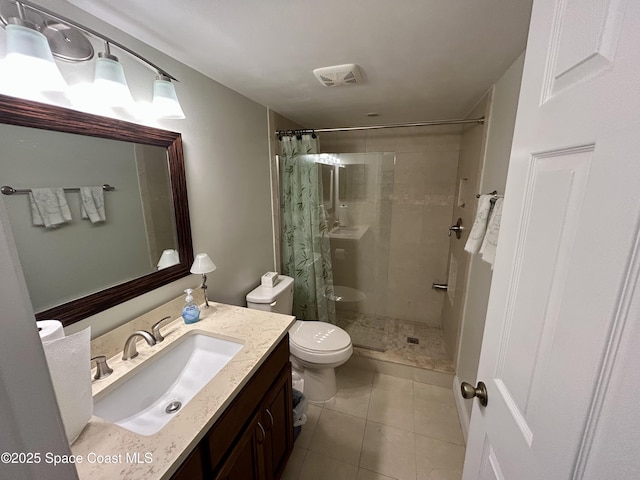 2915 Kirkland Rd NE, Palm Bay, FL 32905 - full bathroom featuring a stall shower, vanity, toilet, and tile patterned floors