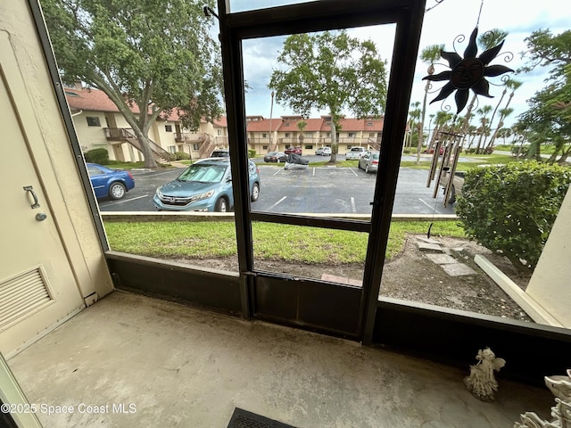 2915 Kirkland Rd NE, Palm Bay, FL 32905 - unfurnished sunroom with a residential view