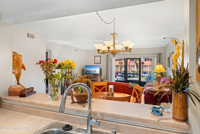 2915 Kirkland Rd NE, Palm Bay, FL 32905 - detailed view of a chandelier and a sink