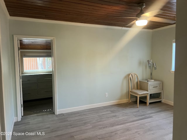 6409 Ridgewood Ave Unit 6409, Cocoa Beach, FL 32931 - unfurnished room featuring wood ceiling, crown molding, baseboards, ceiling fan, and wood finished floors