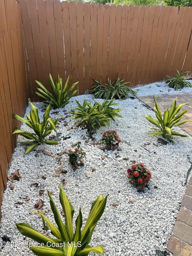6409 Ridgewood Ave Unit 6409, Cocoa Beach, FL 32931 - view of yard