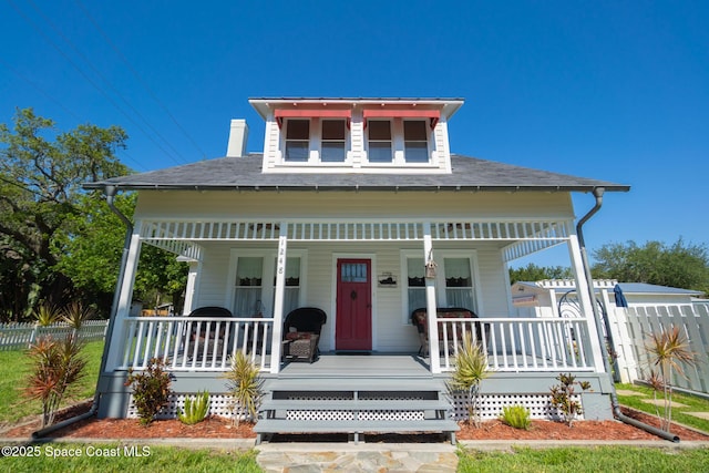 1248 Highland Ave, Melbourne, FL 32935 - view of front of home with a porch and a shingled roof