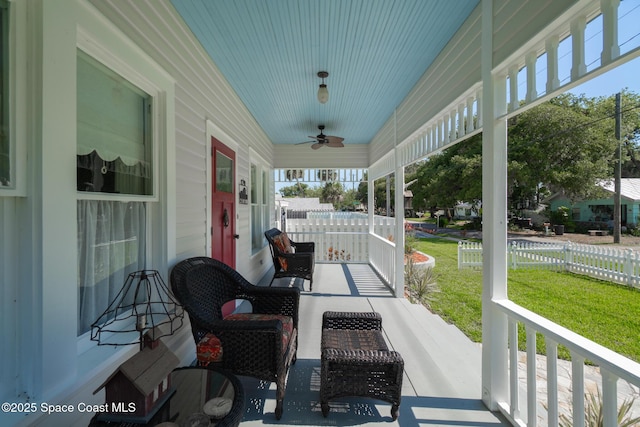 1248 Highland Ave, Melbourne, FL 32935 - covered porch with a ceiling fan