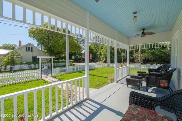 1248 Highland Ave, Melbourne, FL 32935 - sunroom with a ceiling fan and plenty of natural light