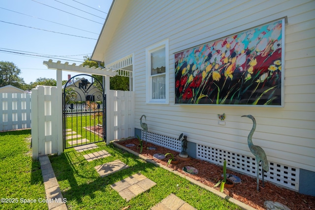 1248 Highland Ave, Melbourne, FL 32935 - view of side of home featuring a gate and crawl space