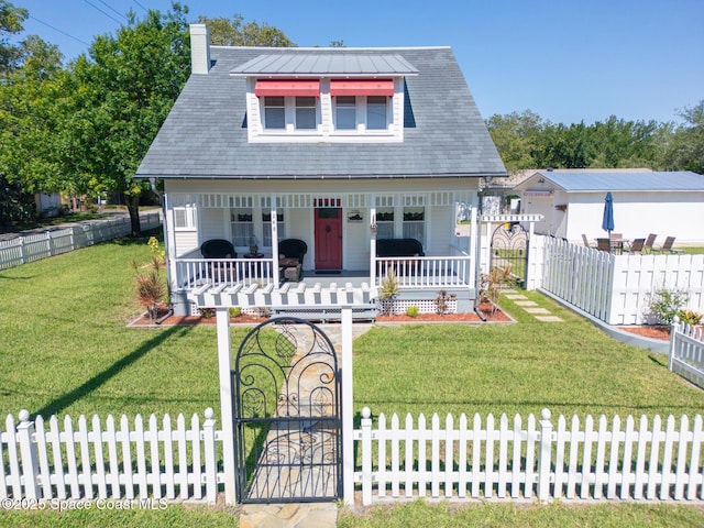 1248 Highland Ave, Melbourne, FL 32935 - view of front facade featuring covered porch, a gate, and a chimney
