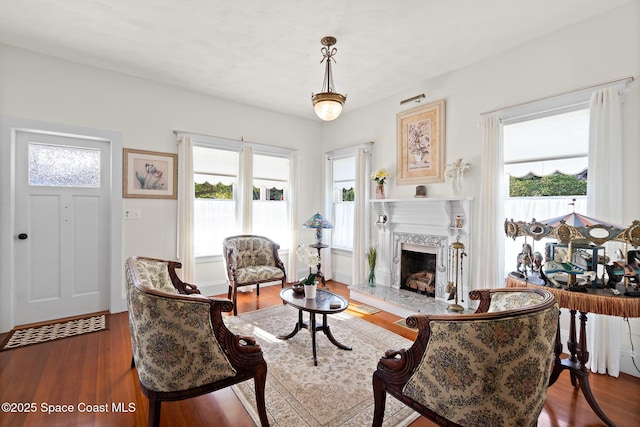 1248 Highland Ave, Melbourne, FL 32935 - living room with wood finished floors and a high end fireplace