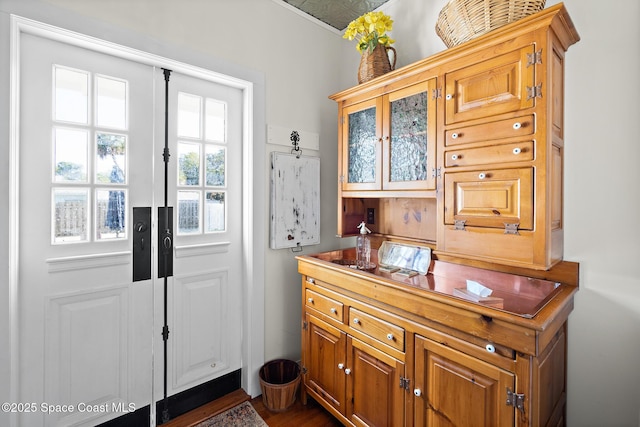 1248 Highland Ave, Melbourne, FL 32935 - doorway to outside with dark wood-style floors
