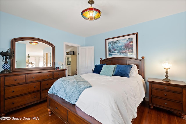1248 Highland Ave, Melbourne, FL 32935 - bedroom with dark wood finished floors