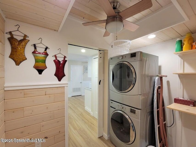2100 N Atlantic Ave Unit 1207, Cocoa Beach, FL 32931 - washroom with stacked washer and clothes dryer, wooden ceiling, a ceiling fan, light wood-style flooring, and recessed lighting