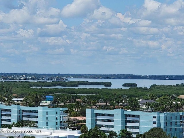 2100 N Atlantic Ave Unit 1207, Cocoa Beach, FL 32931 - drone / aerial view of a nearby body of water and apartment complex / building