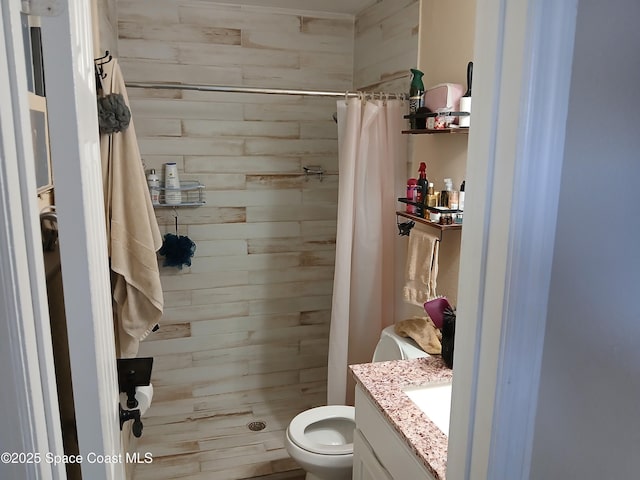 900 E Richland Ave, Merritt Island, FL 32953 - full bathroom featuring toilet, a stall shower, wooden walls, and vanity