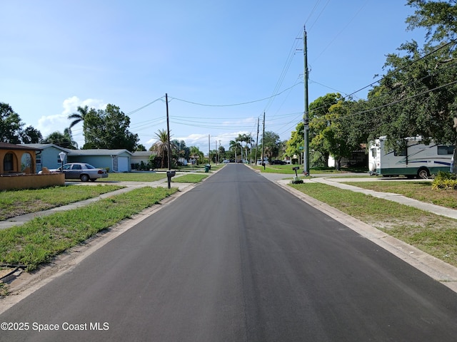 900 E Richland Ave, Merritt Island, FL 32953 - view of asphalt road with sidewalks