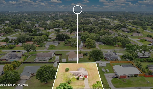 741 Alaska Ave NE, Palm Bay, FL 32907 - aerial perspective of suburban area with property parcel outlined