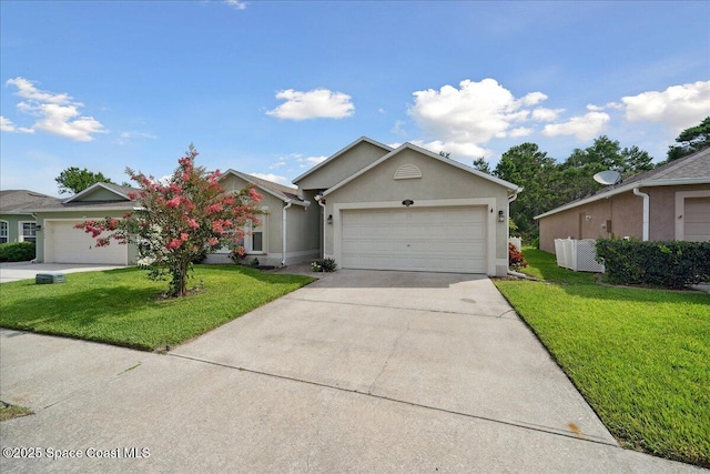 2125 Spring Creek Cir, Palm Bay, FL 32905 - ranch-style house featuring an attached garage, concrete driveway, a front yard, and stucco siding