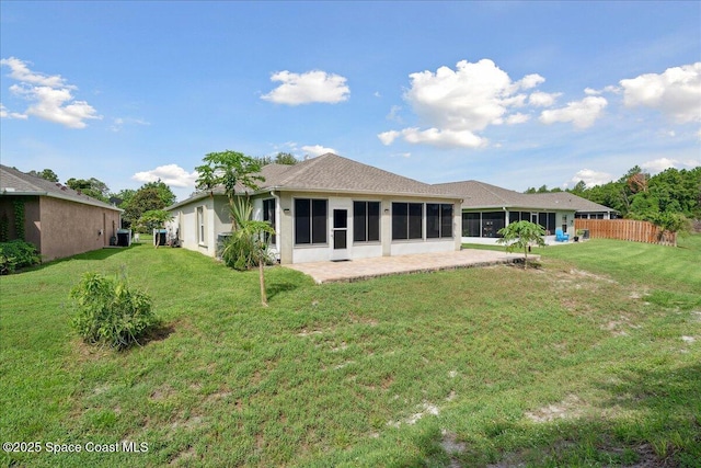 2125 Spring Creek Cir, Palm Bay, FL 32905 - rear view of property with a sunroom, a patio area, stucco siding, and central air condition unit