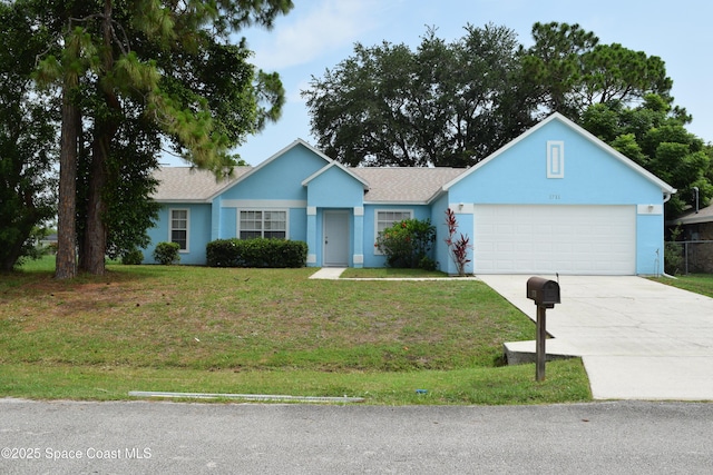 1711 Radisson St NW, Palm Bay, FL 32907 - single story home featuring concrete driveway, an attached garage, a front yard, and stucco siding