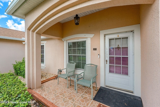 775 Triple Crown Ln, Melbourne, FL 32904 - property entrance with stucco siding