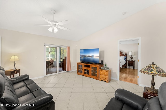 775 Triple Crown Ln, Melbourne, FL 32904 - living area featuring ceiling fan, lofted ceiling, light tile patterned flooring, and baseboards